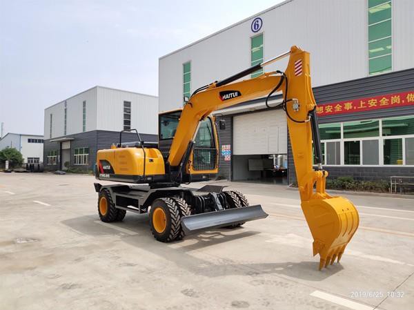 Wheel Excavators With Attachments